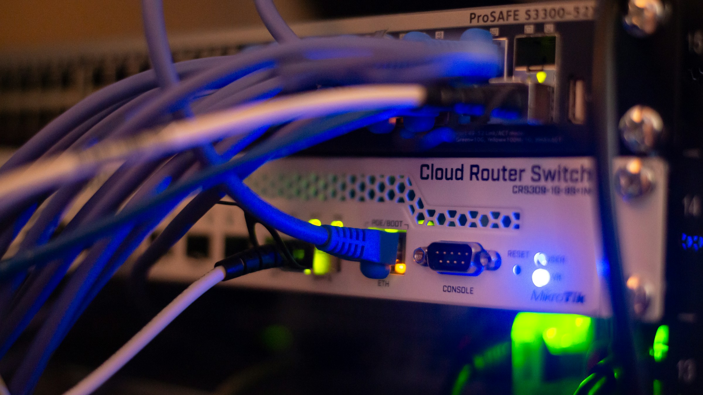 Blue Ethernet cables connected to network switches