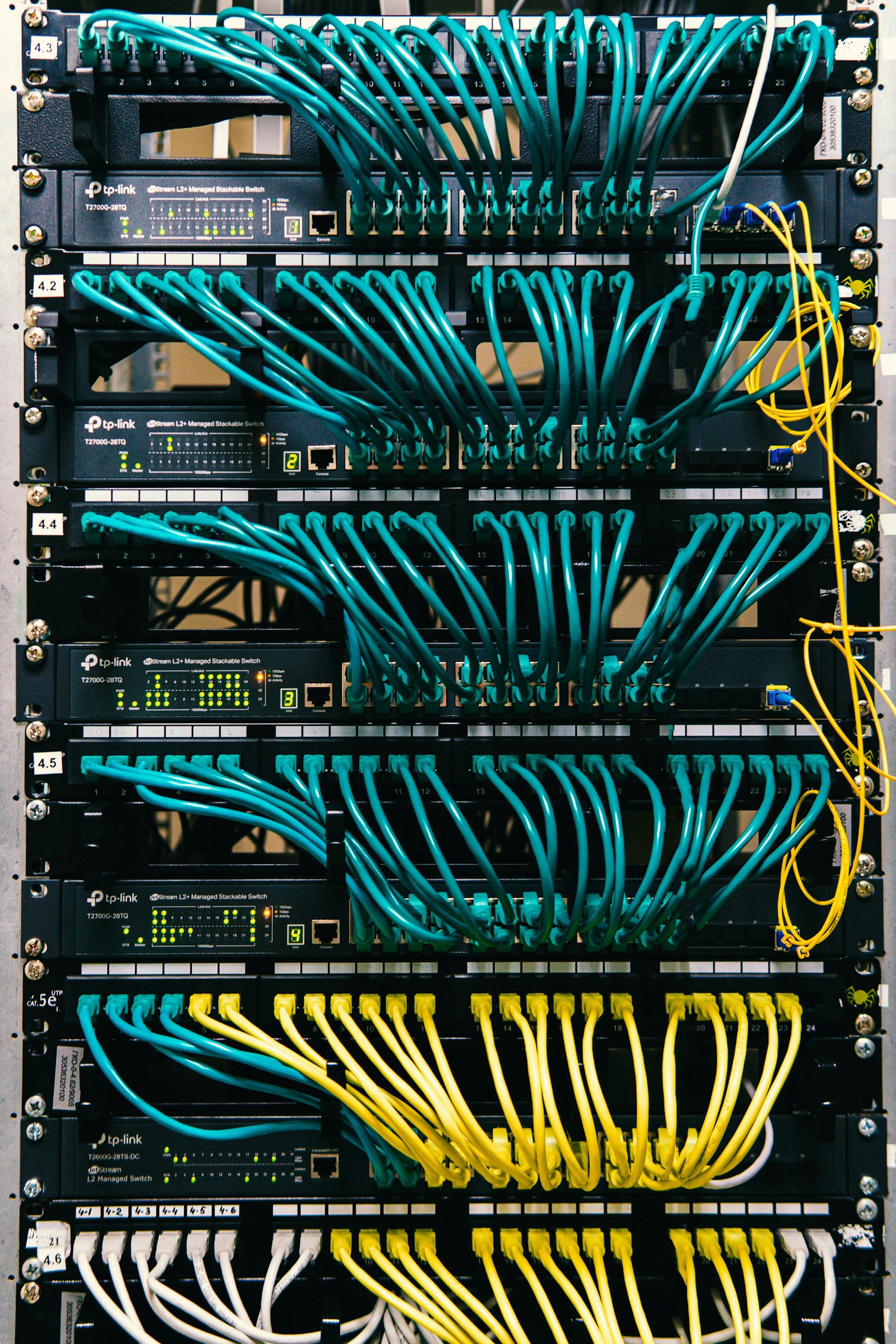Close-up of network switches and connected cables